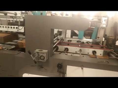 macchina automatica per la reggiatura di scatole con colla